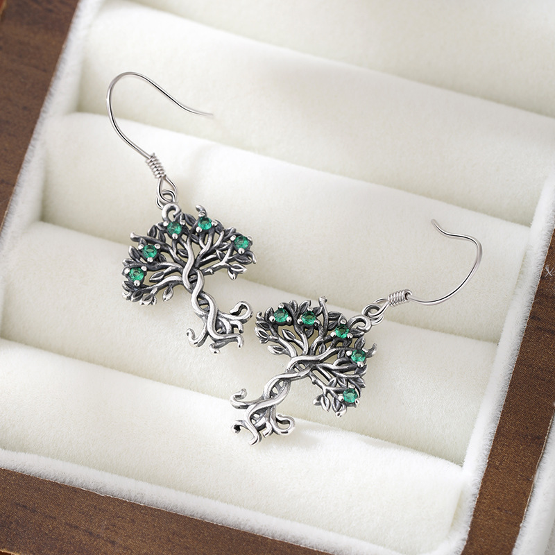 Pendientes con incrustaciones huecas de plata de ley 925 nuevos transfronterizos Pendientes INS Tree of Life Pendientes de todo fósforo retro europeo y americano femenino