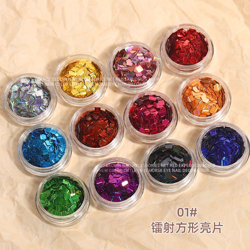 Celebridad en línea láser mariposa lentejuelas nuevo Ojo de caballo rectangular ultra-delgada magia flash uñas joyería 12 colores mezclados traje