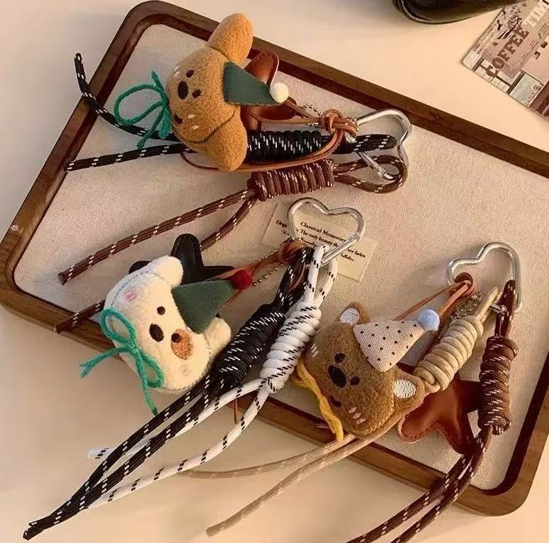 Adorable oso de peluche colgante ~ Miu cuerdas de montaña cuerdas de mano dibujos animados muñecas bolsos colgantes llaves de automóviles moda