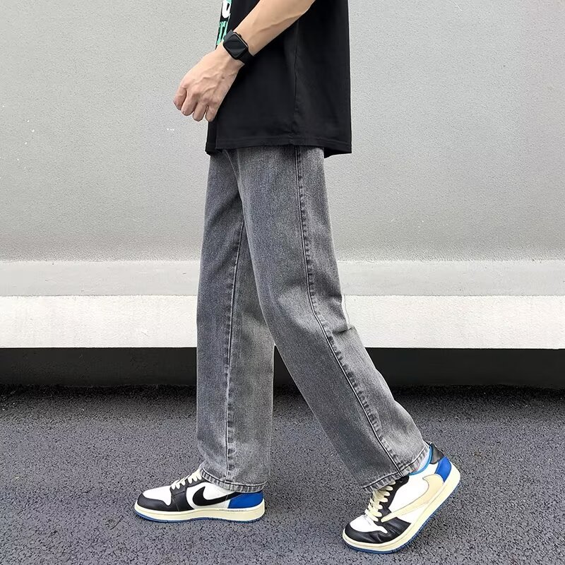 Nuevos jeans de calle alta marca de moda para hombres rectos sueltos europeos y americanos guapos pantalones largos de pierna ancha de calle fritos jeans de moda