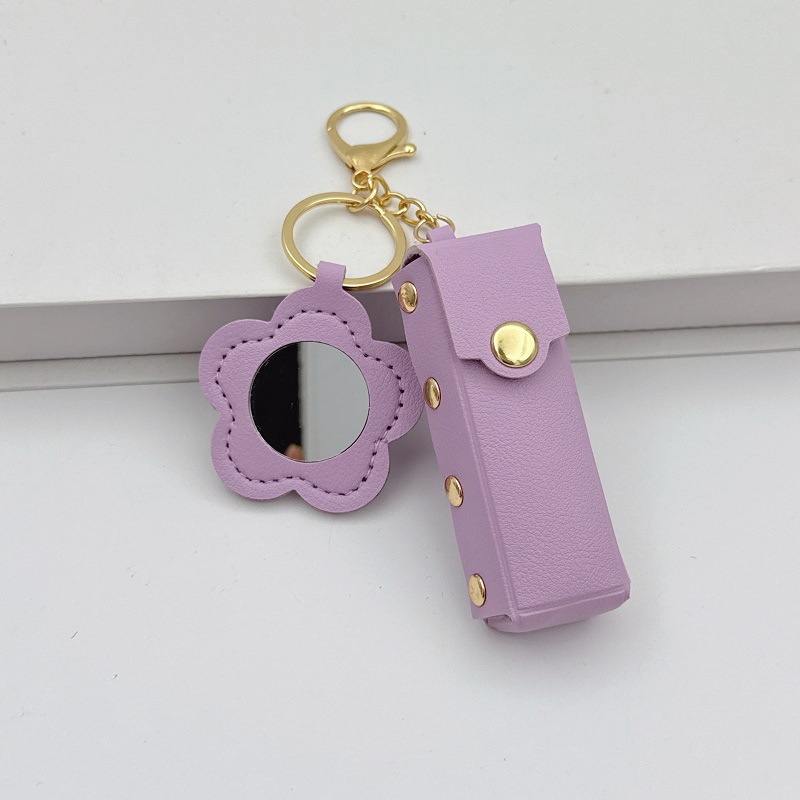 Flor espejo llavero cuero transfronterizo regalo colgante joyería creativo mini lápiz labial almacenamiento llavero colgante