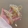 Metal crab pin from pearl, hairgrip with tassels, shark, orchid