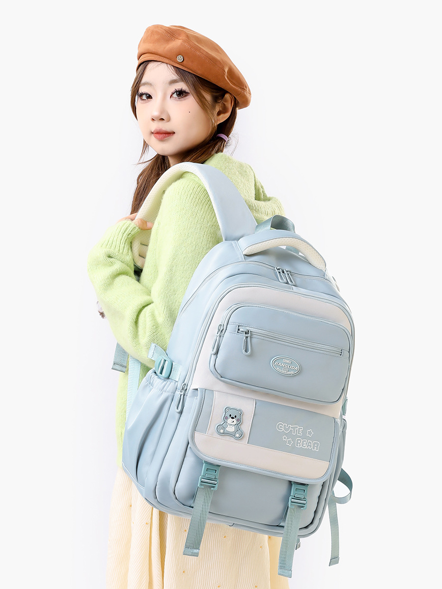 Nueva mochila de escuela secundaria de niñas de tres a seis grados, mochila de moda, mochila ligera de gran capacidad.