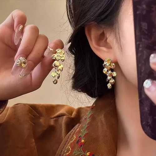 Gold-plated broken leaves ~ New Chinese style golden flower tassel earrings for women light luxury high-end style retro earrings
