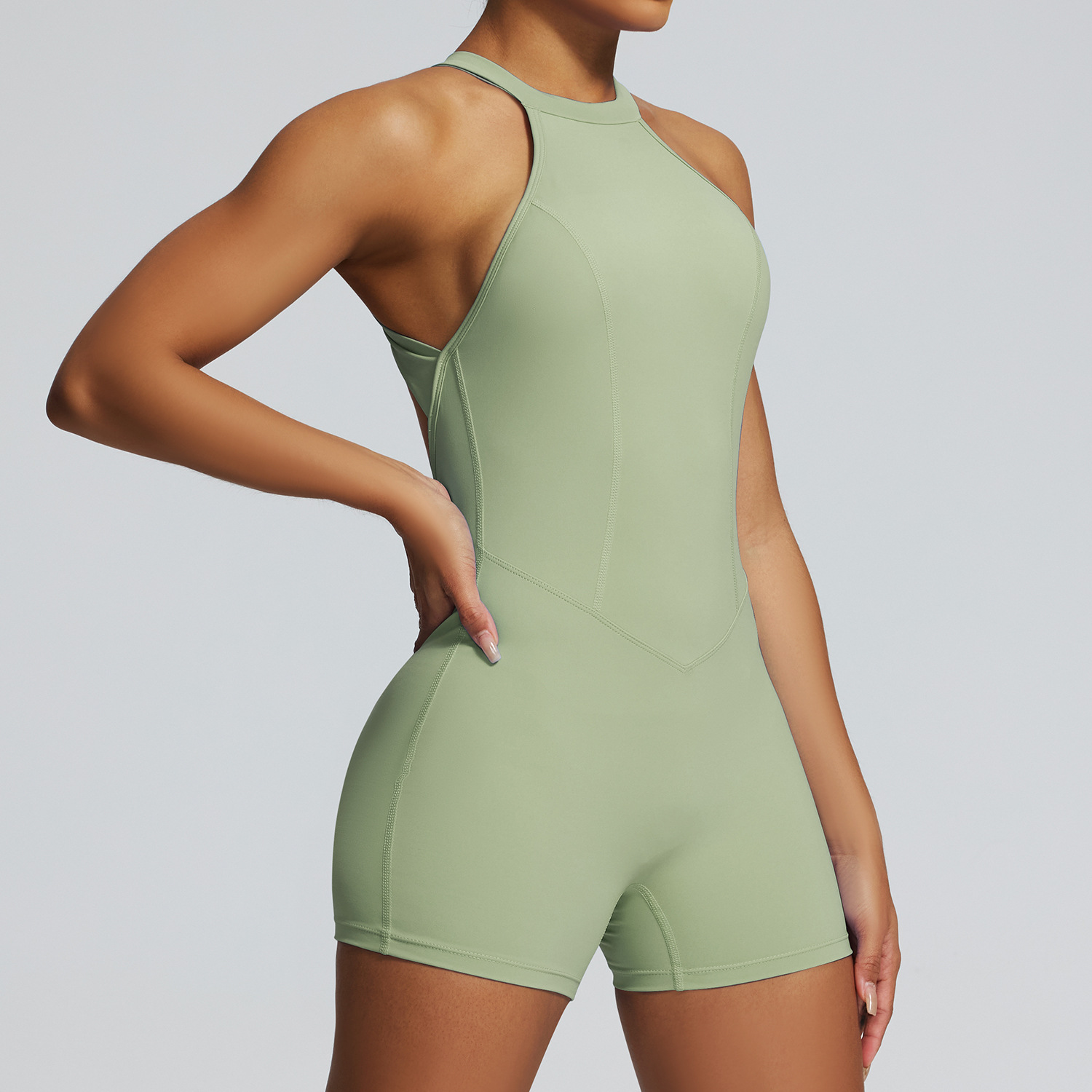 Traje de yoga de una pieza transfronterizo europeo y americano Traje de yoga deportivo para correr Traje de una pieza de fitness de cadera de melocotón ajustado de secado rápido de alta elasticidad