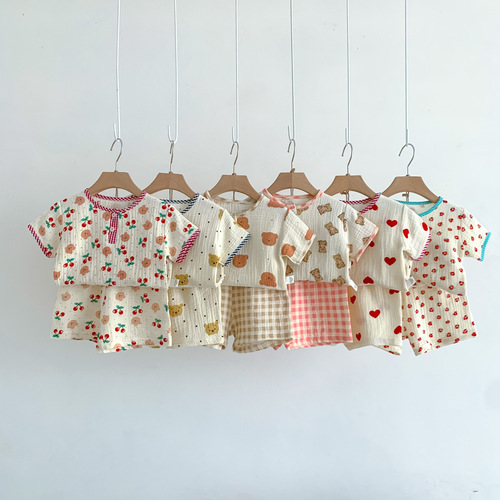 Korean style children's clothing for boys and girls, cartoon printed short-sleeved shorts set, baby summer thin home clothes two-piece set