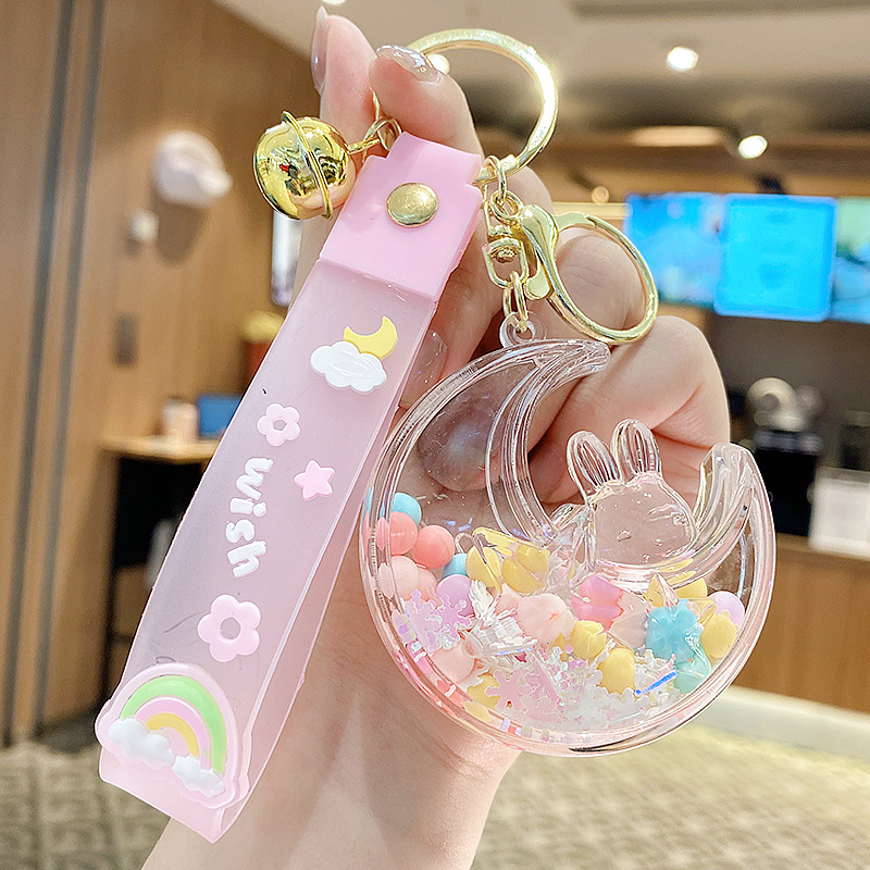 Perla leche taza de té oso colgante aceite flotante botella llavero femenino exquisito colgante mochila arenas movedizas colgante