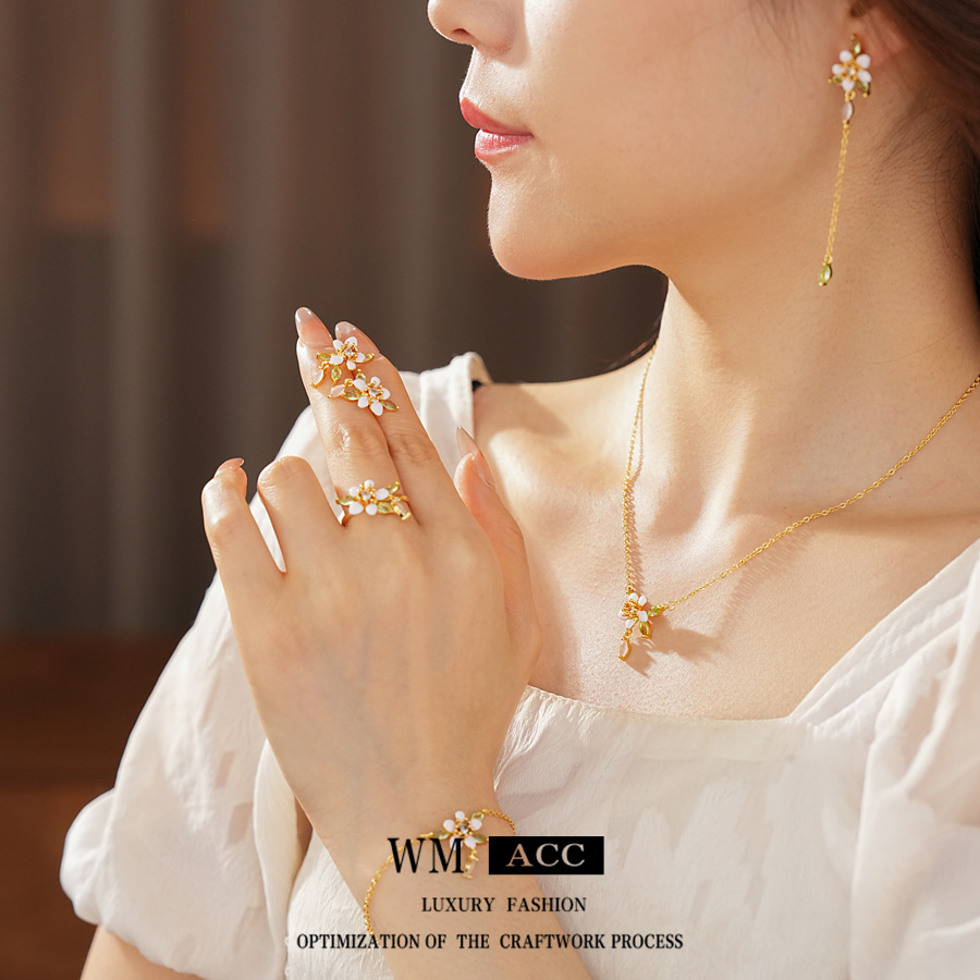 Juego de flores de goteo de aguja de plata de galvanoplastia de oro real, anillo de pulsera de estilo de esmalte retro, collar de lujo ligero, pendientes de sentido avanzado