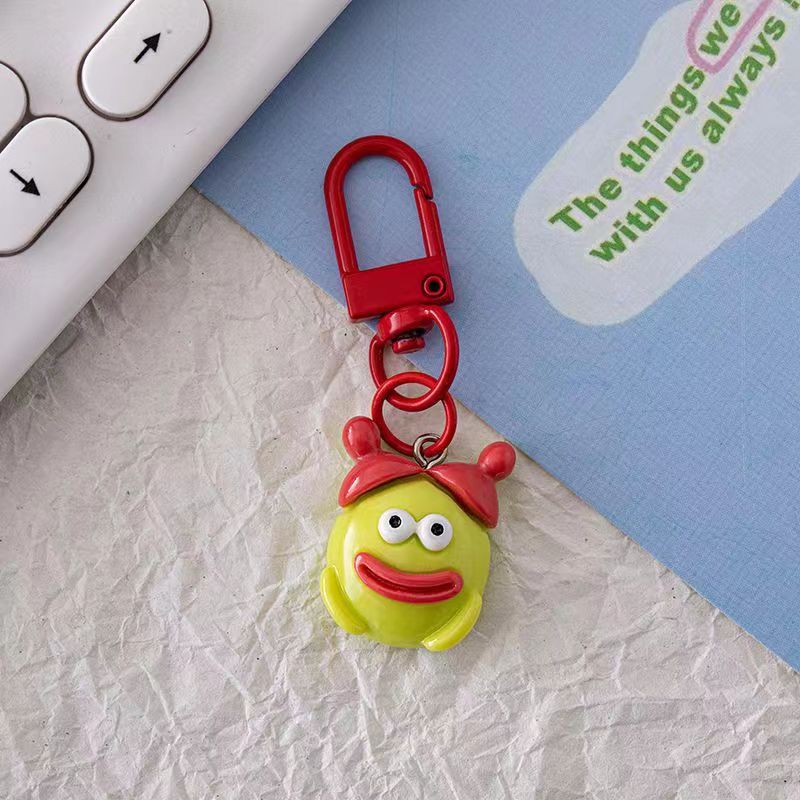 Bonita boca grande extraña llavero salchicha colgante estudiante pequeño libro rojo con accesorios colgante de color para amigos regalos