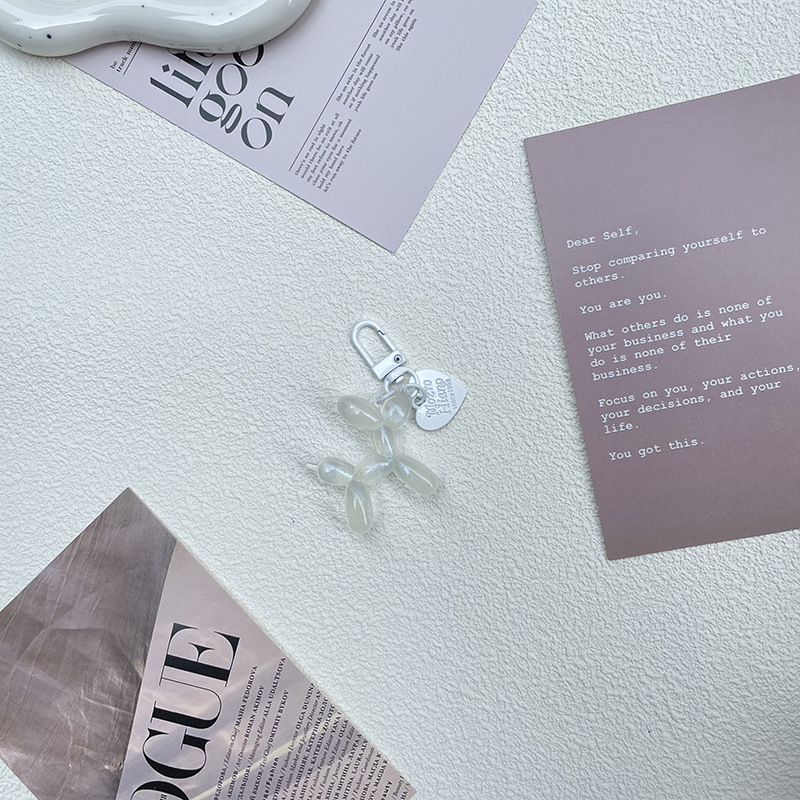 Pequeño Libro Rojo mismo lindo jalea globo láser perro llavero colgante colorido cachorro de dibujos animados teléfono llavero