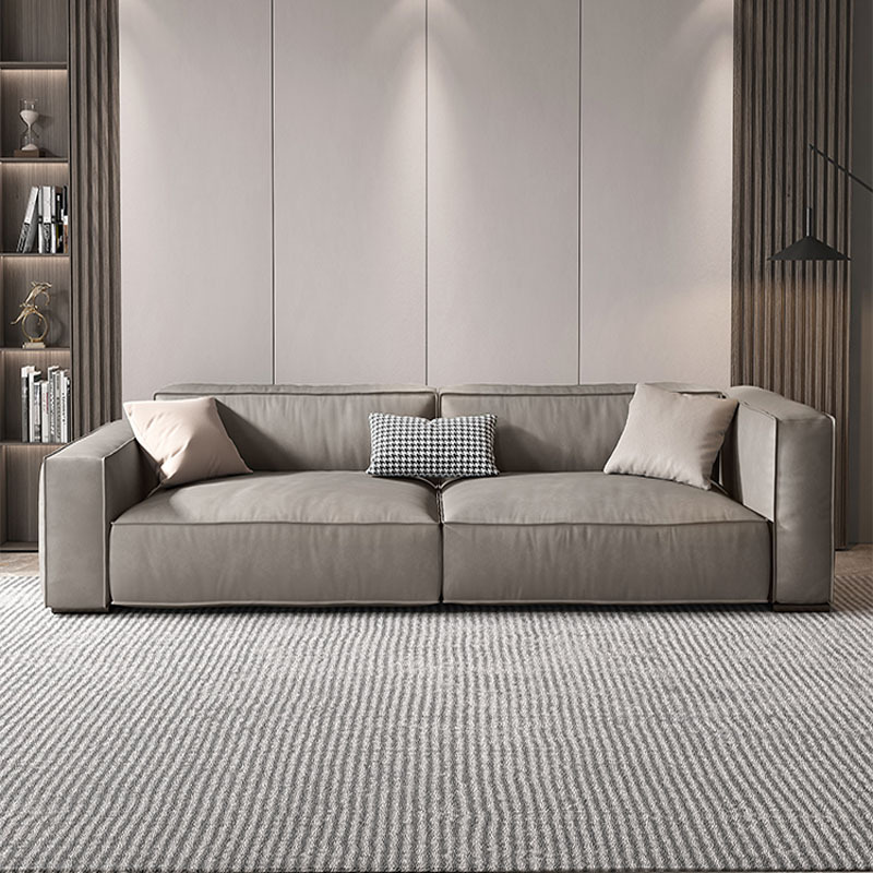 Sofá de cuero genuino estilo tofu italiano para sala de estar, combinación artística moderna minimalista de tres plazas en cuero de grano superior, lujo ligero moderno.