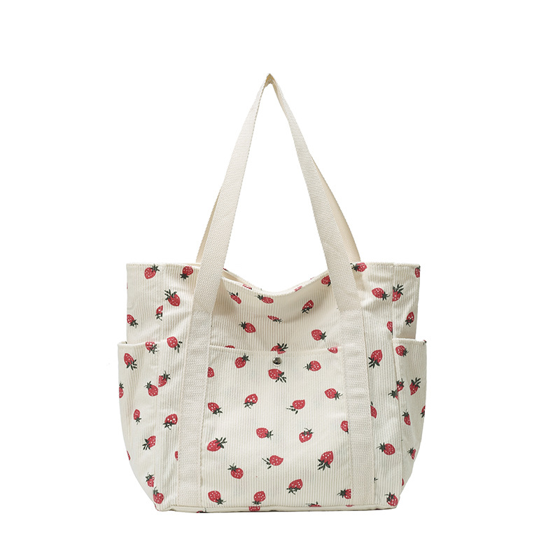 2025 verano nuevo bolso de mano de gran capacidad simple estilo universitario de moda ocio de tela de meandarra bolso de hombro