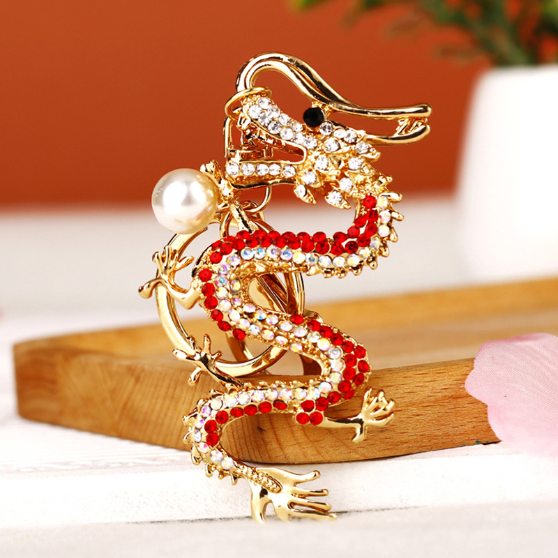 Estilo chino rhinestone doce dragón del zodiaco llavero coche bolso de las mujeres colgante anillo regalo creativo al por mayor