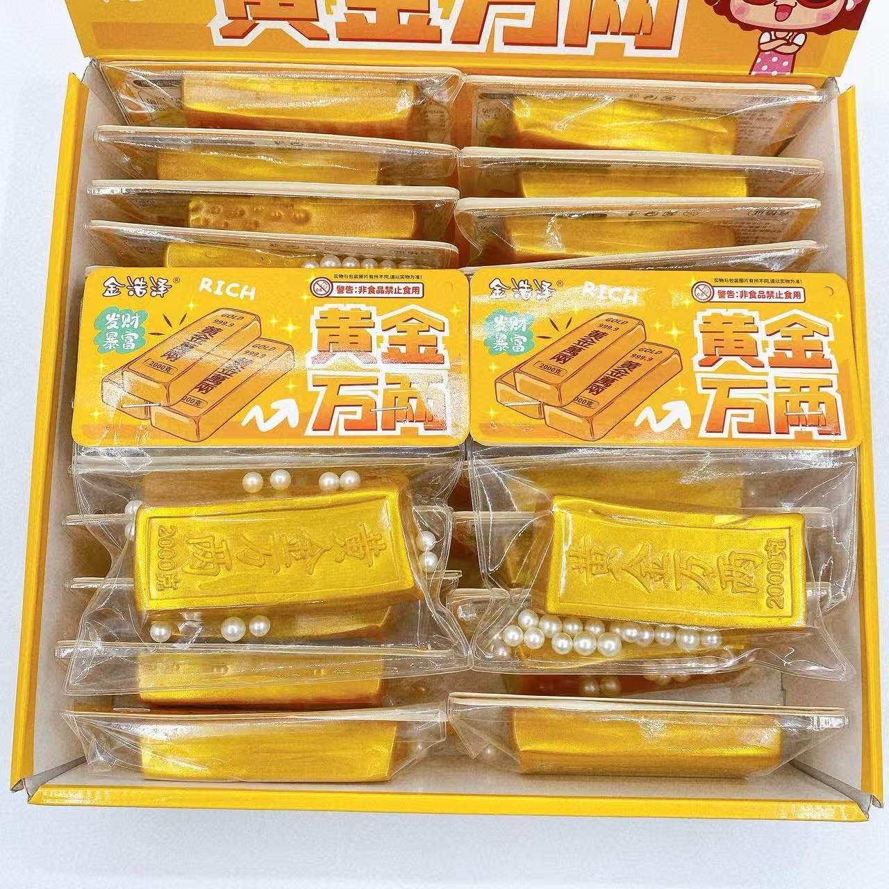 Simulación de oro pellizco pellizco Le Jinyuanbao descompresión rebote lento juguetes creativos novedad fluido pellizco mano al por mayor