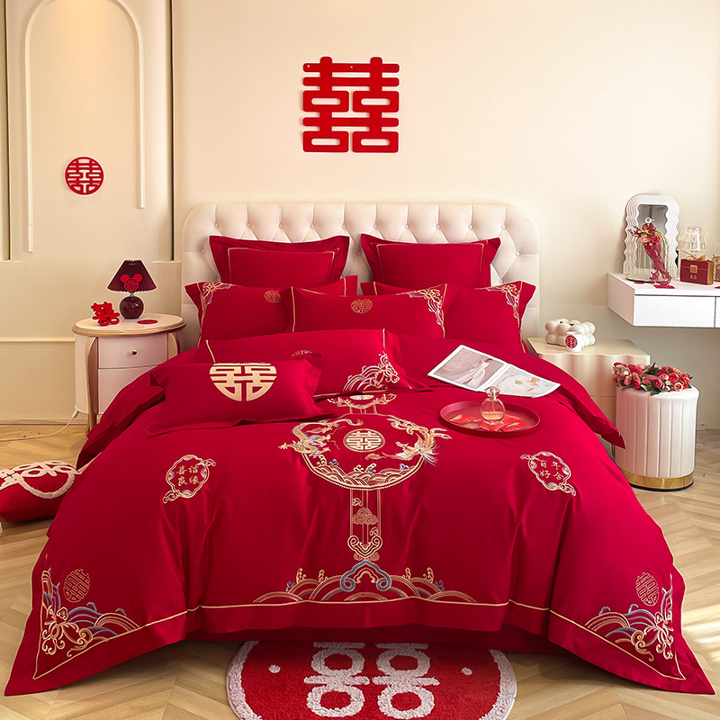 Una clase de madres y bebés de algodón de boda cuatro piezas grandes sábanas bordadas rojas chinas cubierta de cama de boda