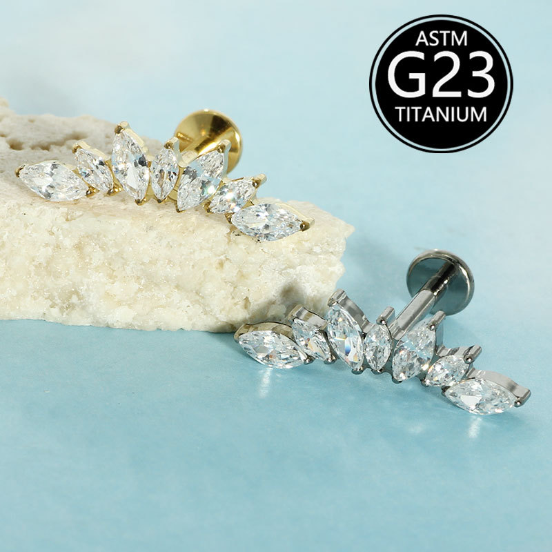 Silver pointed spike labret stud material detail