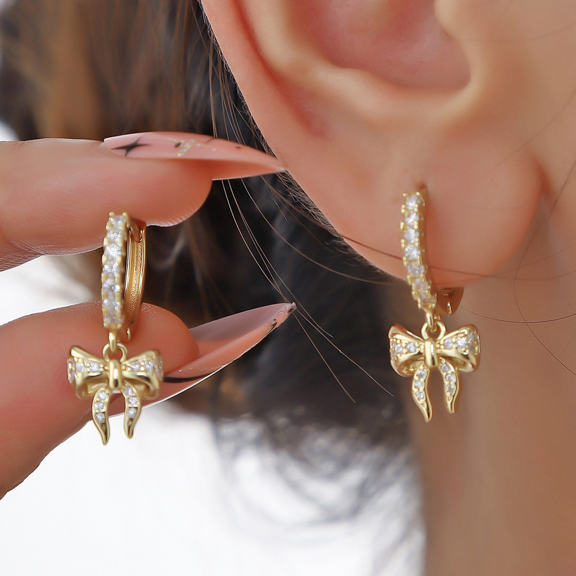copper earrings with zircon with bow