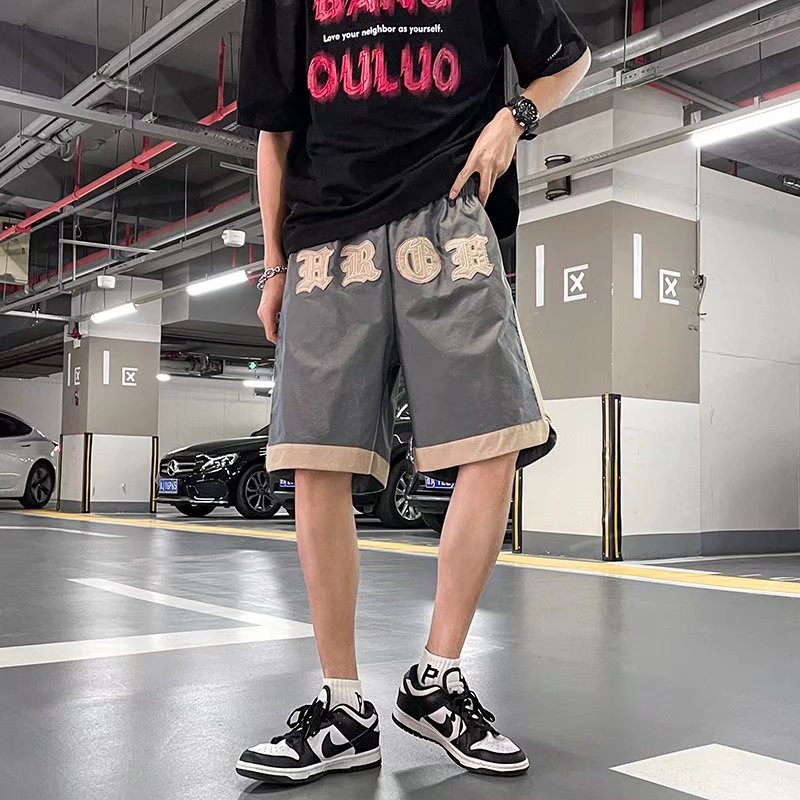 2024 primavera y verano nueva marca de moda callejera europea y americana, camaleón con sentido de la luz, bordado en contraste, moda, deportes, pantalones cortos casuales, hombres