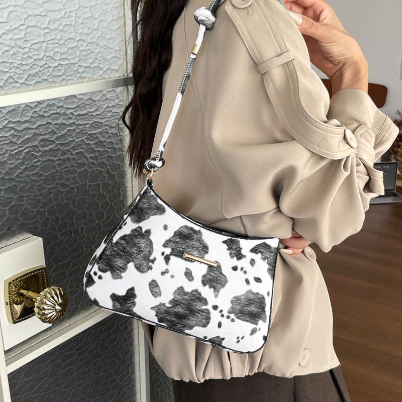 European and American retro-style cow-print handbag for women, 2026 autumn new collection, featuring a textured design, suitable for commuting, and can be carried as a shoulder bag or crossbody bag
