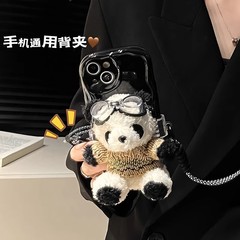 かわいいパイロットのパンダの熊のぬいぐるみの背もたれは斜めに掛けます。