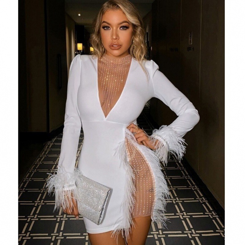 2022 European and American women's clothing in autumn and winter hot-selling mesh stitching feather decoration slim-fit dress women