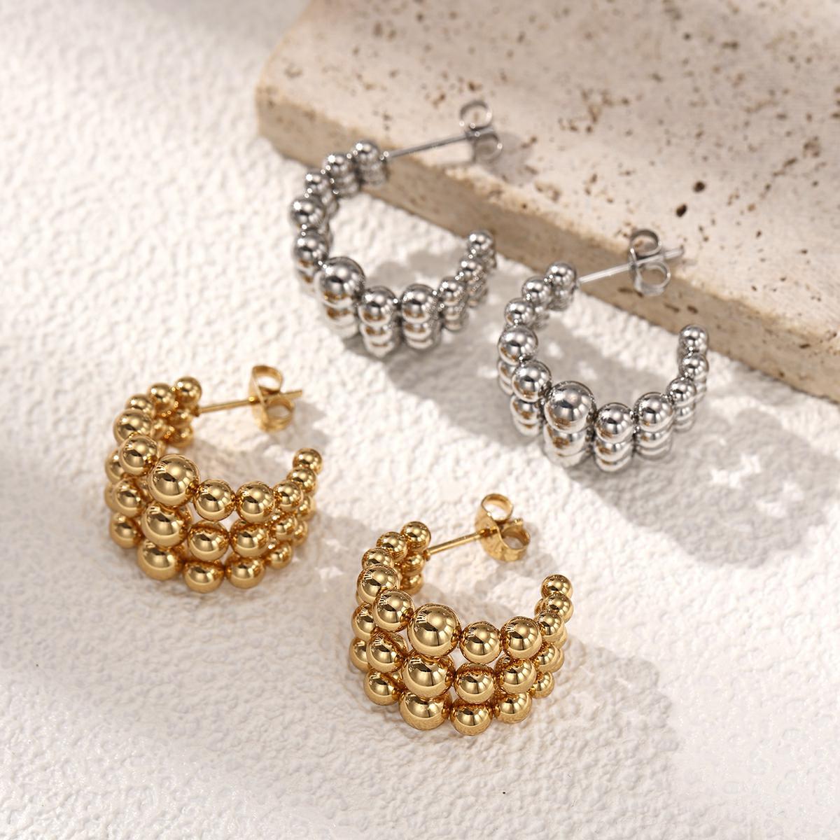TENA Europa y América de acero inoxidable pendientes de mujer lujo ligero de alta calidad tapones de acero dorado venta caliente joyería de acero de titanio transfronteriza