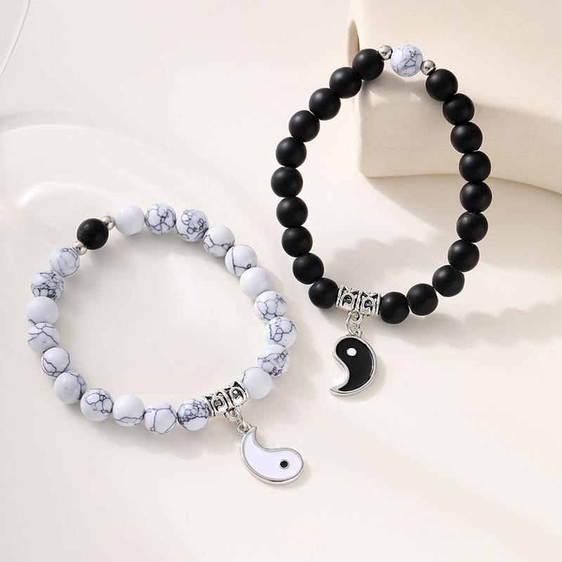 Amazon explosivo Yin Yang goteo de aceite blanco y negro Tai Chi para parejas colgante pulsera negro esmaltado blanco pino un par de pulseras transfronterizas