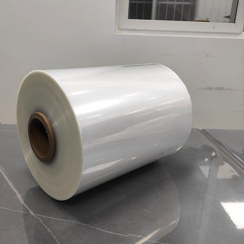 Fábrica al por mayor POF película retráctil película criogénica transparente reticulada película plegable cosmética embalaje Termocontraíble película de sellado de plástico