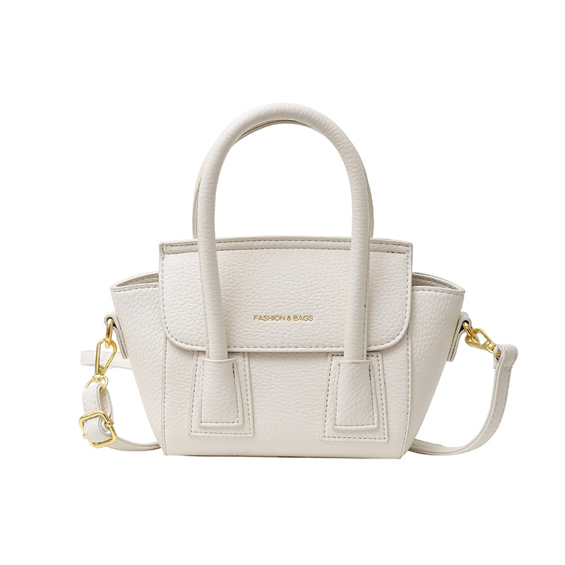 Bolsos populares de este año 2025 primavera nuevo bolso femenino casual patrón de lichi bolso de hombro letra todo fósforo bolso de mensajero