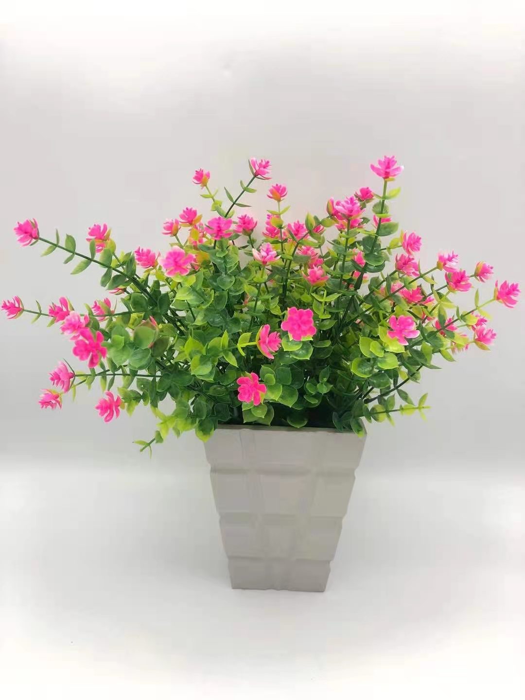 AliExpress Venta caliente artificial planta verde 7 cabezas 35 malla eucalipto Camelia flor artificial Flor de plástico flor decorativa