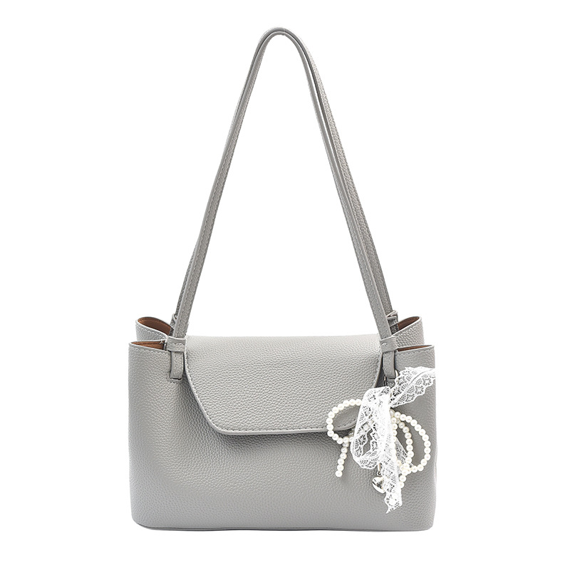 Bolso Tote de cercanías todo-fósforo de nicho retro transfronterizo para mujer 2025 primavera nuevo estilo estilo occidental bolso de axila de un solo hombro de gran capacidad