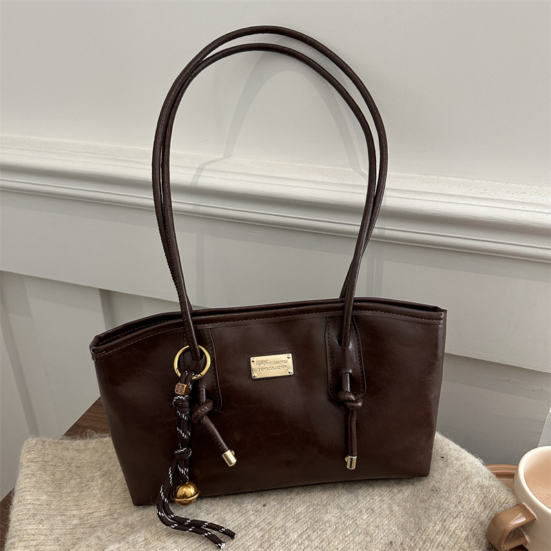 Bagos retro extranjeros para mujeres 2024 nueva moda cera petot bolso de otoño y invierno popular bolsa de hombro de viaje