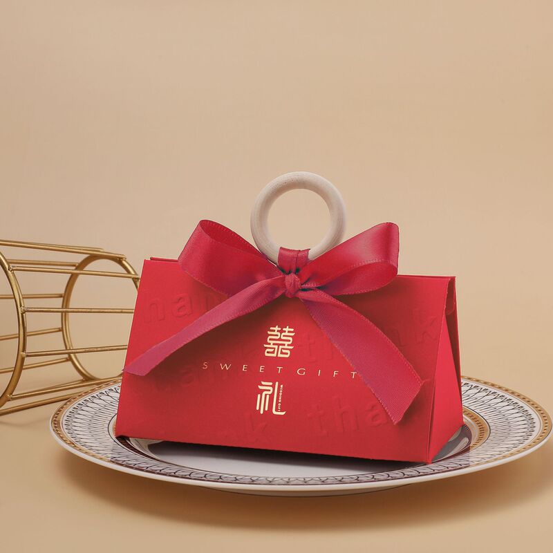 クリエイティブシャンパン色の手提げ婚約結婚結婚式の三角喜糖箱木環お土産魚尾紗喜糖箱|undefined