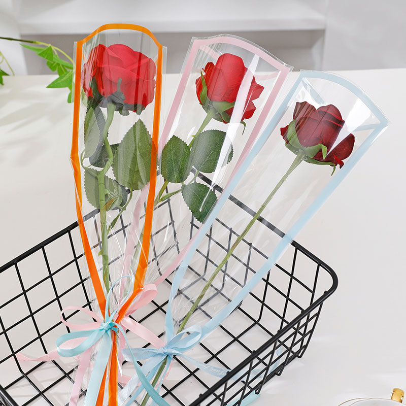 Día de San Valentín borde de color bolsas de flores rosas claras bolsas de embalaje OPP DIY material de embalaje floral