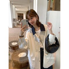 IMISSは色にぶつかってショートコートの女性の小さい子の2025早春の新型の高級感の中で長いコートをつなぎ合わせます。