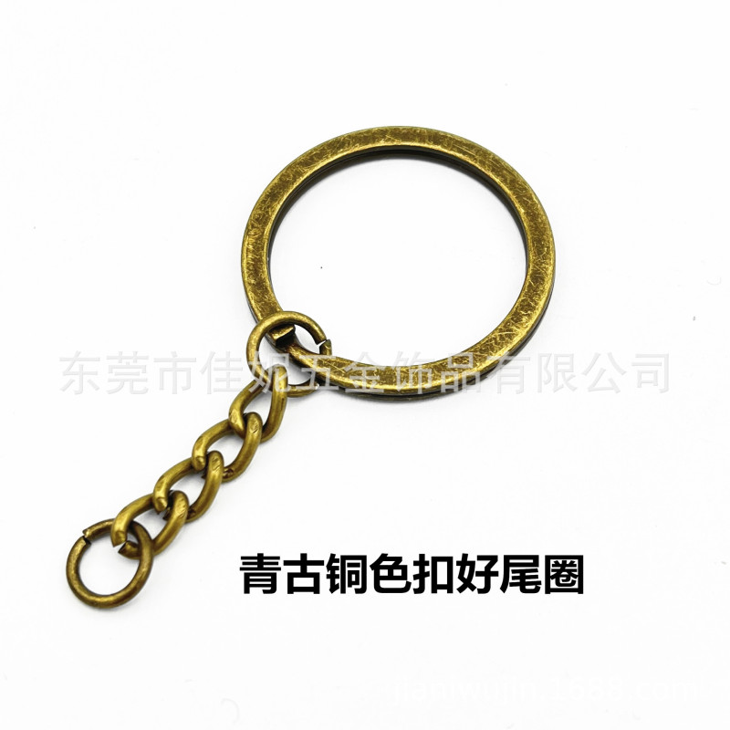 元のメーカーの現物の金色のキーホルダーは四つのチェーンを持っています。|undefined