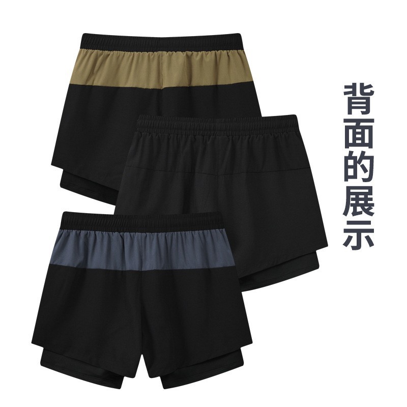 Pantalones cortos deportivos casuales de secado rápido para hombres verano Delgado forrado maratón pista y campo de tres puntos corriendo fitness pantalones de baloncesto