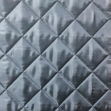 菱形格個性圖案絎棉壓花加工復合無紡布壓花卷材面料廠家定制
