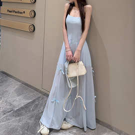蝴蝶结气质显瘦吊带连衣裙女2025春季设计感两穿超仙收腰显瘦长裙