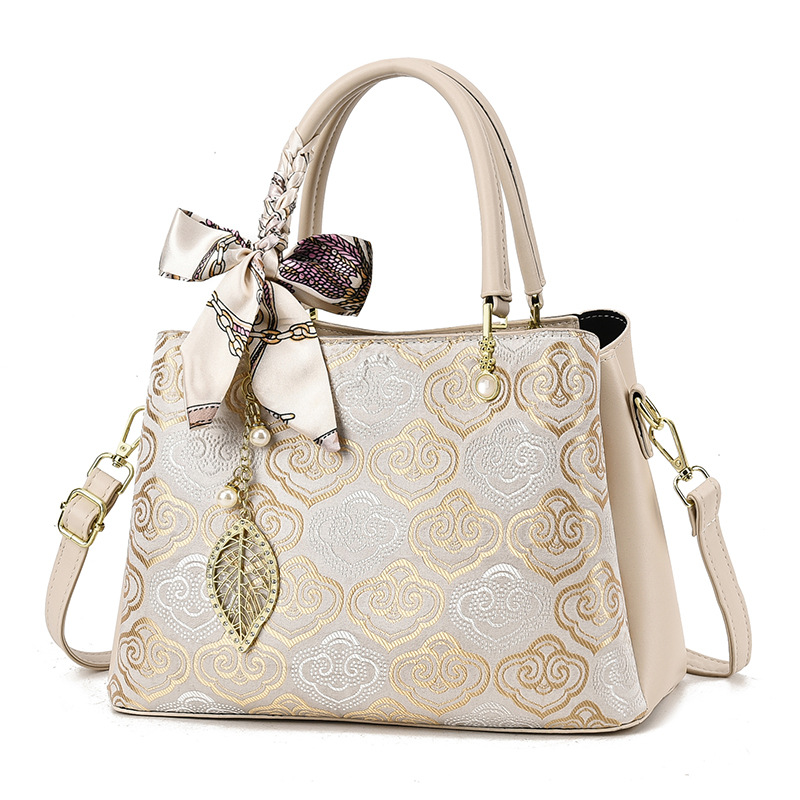 Día de la Madre 2026 nuevo estilo nacional de lujo ligero bolso de mano de estilo de mujer gran capacidad de viaje de hombro mochila