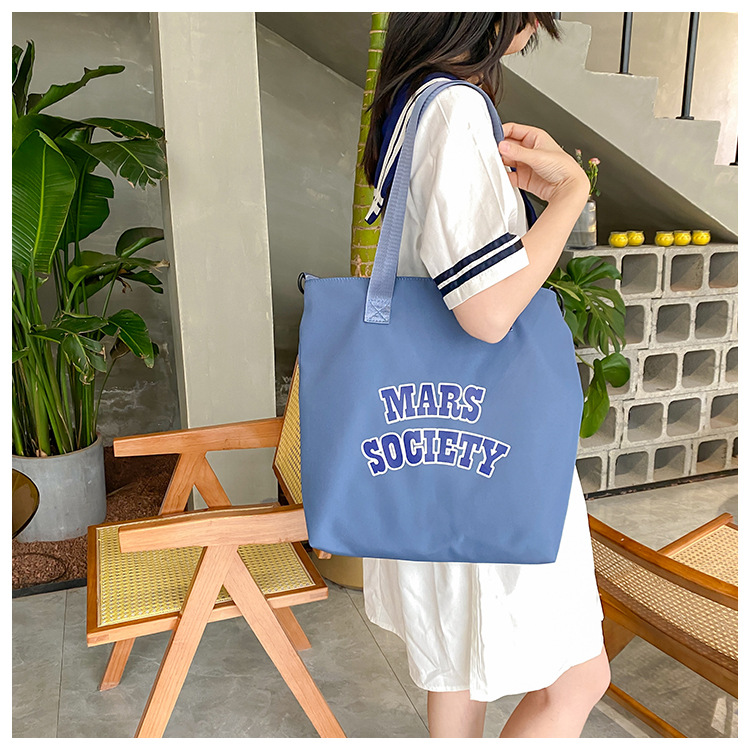 Canvas bag for women, single shoulder, ins crossbody, laid-back style, college student class bag, artistic Japanese style, large capacity, Hong Kong style, chic undefined