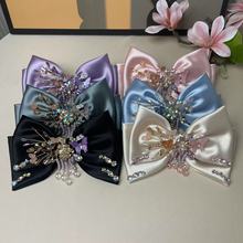 新款原创设计重工满钻镶边珍珠吊坠蝴蝶结高级感法式发夹弹夹新款