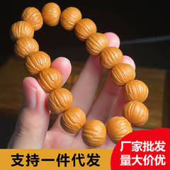 猿の頭の手の串は手で京の八稜の小さいクルミを卸売りします。