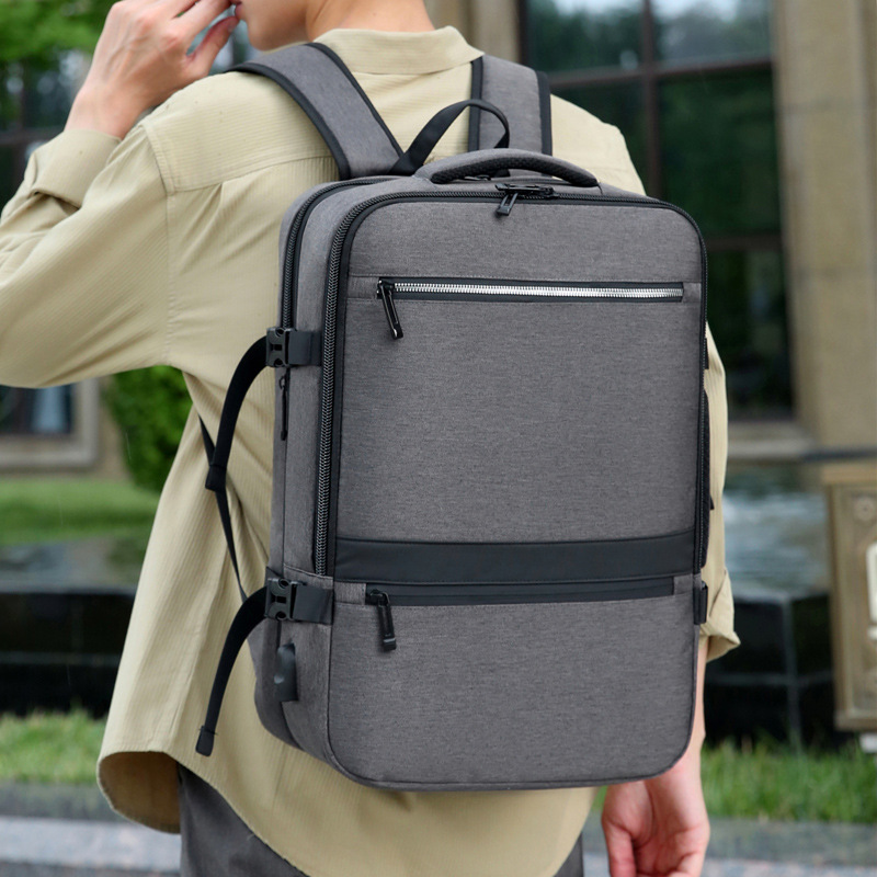 Comercio exterior nueva mochila de hombre de color sólido ocio versátil bolso de computadora de negocios portátil doble espalda expansión bolso de estudiantes