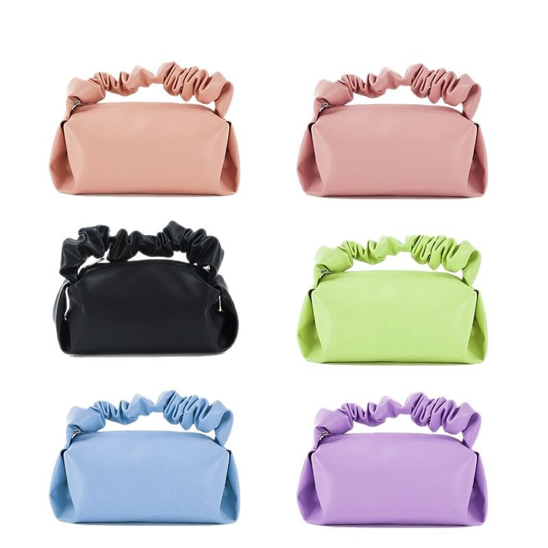 Fabricantes al por mayor bolso de mano para mujer bolso de nube plisada de diseño de nicho francés bolso de almacenamiento de cosméticos multifuncional