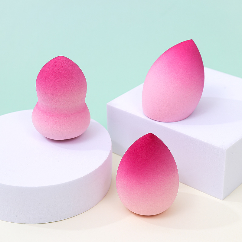 Estilo transfronterizo color degradado maquillaje de huevo soplo de polvo no látex color spray en forma de calabaza maquillaje esponja maquillaje huevo personalizado de fábrica
