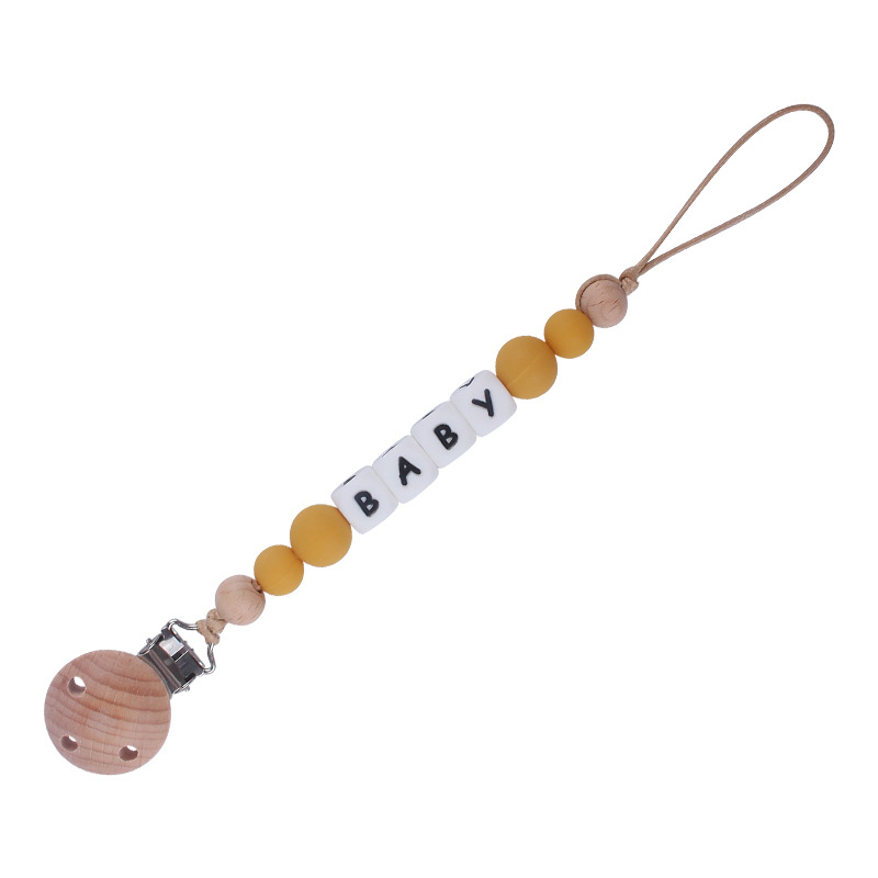 Nuevos suministros para bebés Haya agujero redondo clip bebé creativo DIY chupete Cadena de silicona mordedura de juguete cadena anti-caída