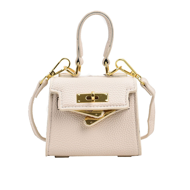 Mini bolso Kelly transfronterizo para niños, bolso de hombro tipo bandolera de un solo hombro con lápiz labial familiar de moda versión coreana de otoño 2023 para mujer