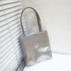 Silver-gray, handheld