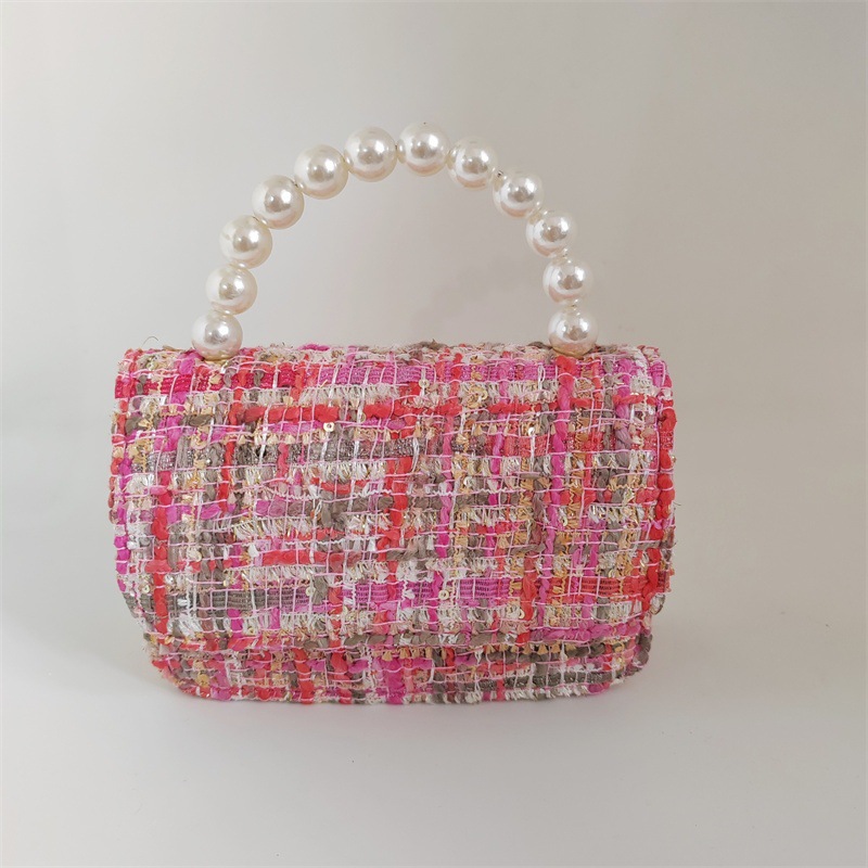 2025 primavera y verano estilo caliente moda casual niños dulces bolsa de gelatina mini bolso de mensajero de un solo hombro variedad al por mayor